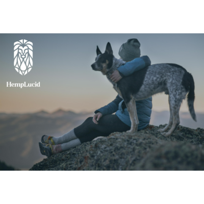 Hemplucid Pets Chicken Flavored USDA Organic CBD Oil - Photo of Guy with Dog on a Cliff