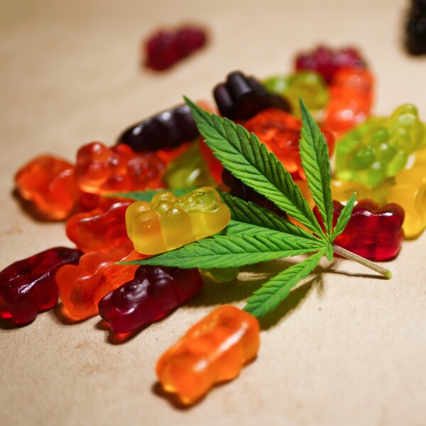 Order Legal Delta 9 THC Edibles Online - Image of Gummies + Cannabis Leaf