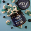 R+R Medicinals CBN Sleep Gummies with CBD - Decorative Image with Gummies Spread Out and Jar Open