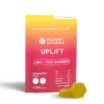 Alchemy Naturals 25mg CBD Uplift Gummies for Mood & Workout - Front of Bag with Two Gummies Outside The Bag