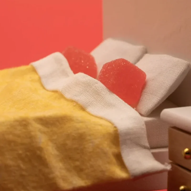 100 Sheep Strain Gummies Tucked Into Bed