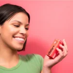 Drops River Float Indica THC Gummies – Live Rosin - Girl Holding Gummy Tin In Her Hand