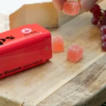 Drops River Float THC Gummies – Tin Open With Gummies On Table