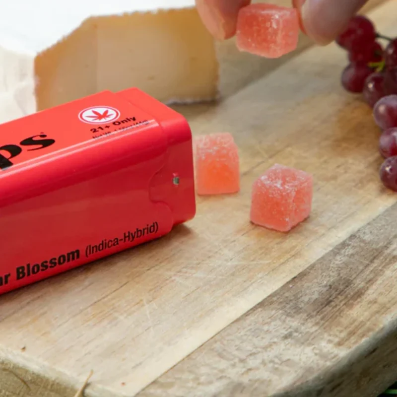 Drops River Float THC Gummies – Tin Open With Gummies On Table